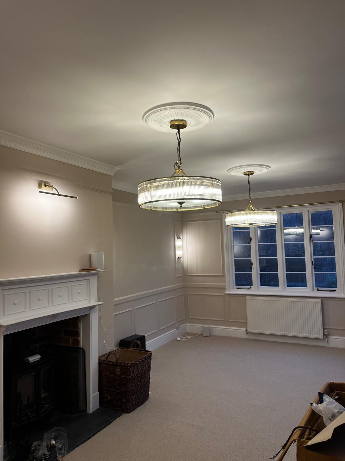 Panelled front room with plaster cornice and new carpet