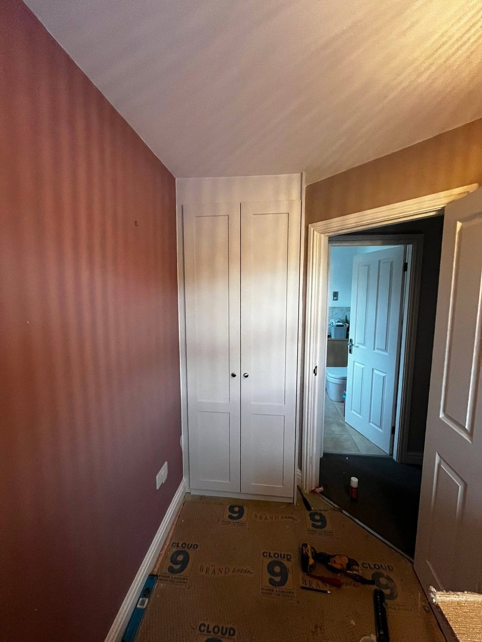 Bedroom with fitted wardrobes and fresh decoration